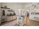 Dining area featuring tile floors, a coffee bar, and a table with chairs, perfect for entertaining at 9580 Grove Rd, Brooksville, FL 34613