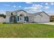 Inviting single-Gathering home with a well-manicured lawn and welcoming curb appeal at 9826 La Vonda St, Riverview, FL 33569