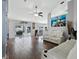 Bright living room with sliding glass doors leading to outdoor area, and tile flooring at 9826 La Vonda St, Riverview, FL 33569