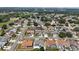 Aerial view of a residential neighborhood with well-maintained homes, green spaces, and community streets at 9826 La Vonda St, Riverview, FL 33569