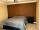 Cozy bedroom featuring a large bed and ample space at 105 S Obrien St # 216, Tampa, FL 33609