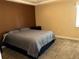 Bedroom featuring a large bed and ample space at 105 S Obrien St # 216, Tampa, FL 33609