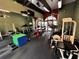 Community fitness center with treadmills, weights, and fitness equipment at 105 S Obrien St # 216, Tampa, FL 33609