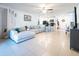 Spacious living room flowing to the kitchen, creating a comfortable living space at 1107 Brenton Leaf Dr, Ruskin, FL 33570