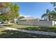 A sprawling backyard with a privacy fence encloses the property, offering ample space and seclusion at 11749 Summer Springs Dr, Riverview, FL 33579