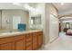 Main bathroom featuring a double vanity, ample lighting, and a spacious layout at 11749 Summer Springs Dr, Riverview, FL 33579