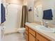 Functional bathroom featuring a walk-in shower and a single sink vanity at 11749 Summer Springs Dr, Riverview, FL 33579