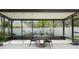 Cozy screened patio perfect for outdoor dining and entertaining overlooking the well-maintained backyard at 11749 Summer Springs Dr, Riverview, FL 33579