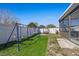 Fenced backyard featuring a colorful playset at 12256 Katherwood St, Spring Hill, FL 34608