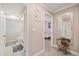 The hallway leads to the bathroom, bedroom, and front door at 12256 Katherwood St, Spring Hill, FL 34608