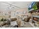 Inviting living room featuring tile floors, fireplace, plush seating and an open layout with the entrance at 12256 Katherwood St, Spring Hill, FL 34608