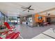 Large patio featuring a kitchenette, billiard table, dining area, and plenty of space for entertaining guests at 12256 Katherwood St, Spring Hill, FL 34608