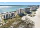 Panoramic aerial view showcases oceanfront high-rise condos, beach, and scenic waterfront, highlighting premier location at 1270 Gulf Blvd # 905, Clearwater Beach, FL 33767