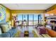 Comfortable living room with ocean views, cozy seating, and stylish decor at 1270 Gulf Blvd # 905, Clearwater Beach, FL 33767