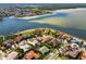 Beautiful waterfront home with private pool, lush landscaping, and stunning views of the bay at 1314 Jumana Loop, Apollo Beach, FL 33572