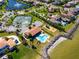 Community amenities with pool, tennis courts, playground, and beach access at 1314 Jumana Loop, Apollo Beach, FL 33572