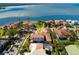 Stunning waterfront home with a private pool and lush landscaping, offering breathtaking views of the bay at 1314 Jumana Loop, Apollo Beach, FL 33572