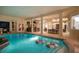 Spacious indoor pool with a hot tub, and access to the backyard at 1314 Jumana Loop, Apollo Beach, FL 33572