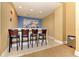 Enjoy a stylish bar area with comfortable seating and elegant decor for relaxing and socializing at 140 Riviera Dunes Way # 404, Palmetto, FL 34221