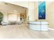 Inviting lobby with stylish seating, a modern reception desk, and elegant decor at 140 Riviera Dunes Way # 404, Palmetto, FL 34221