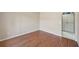 Clean bedroom with a built-in closet and wooden floors at 14048 Bruni Dr, Spring Hill, FL 34609