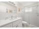 Clean bathroom with white vanity, sleek fixtures, and glass-enclosed shower at 2379 Finlandia Ln # 21, Clearwater, FL 33763