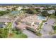Overhead view of the building exterior near a parking area and pool at 2379 Finlandia Ln # 21, Clearwater, FL 33763