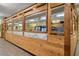 Inviting cafe area with wood paneling and large windows offering natural light at 2379 Finlandia Ln # 21, Clearwater, FL 33763