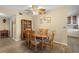 Cozy dining area with a wooden table, seating for four, and stylish decor at 2379 Finlandia Ln # 21, Clearwater, FL 33763