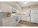Well-lit kitchen with modern appliances, ample counter space, and a clean, functional design at 2379 Finlandia Ln # 21, Clearwater, FL 33763