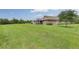 Expansive backyard provides lots of room and features a screened in lanai at 30142 Sotogrande Loop, Wesley Chapel, FL 33543