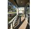 Charming front porch view of a landscaped home in a suburban setting at 30142 Sotogrande Loop, Wesley Chapel, FL 33543