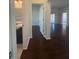 View of the hallway leading to an open floor plan at 30142 Sotogrande Loop, Wesley Chapel, FL 33543