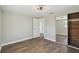 A bright bedroom features modern flooring, closet and fresh paint at 4209 Westwood Dr, Holiday, FL 34691