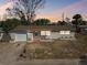 Charming single-story home with brick accents and a well-maintained front yard at 4209 Westwood Dr, Holiday, FL 34691