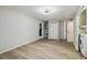 Laundry room with modern washer and dryer, closet, and painted cinder block wall at 4209 Westwood Dr, Holiday, FL 34691