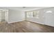 Living room with modern flooring and freshly painted walls, bathed in natural light at 4209 Westwood Dr, Holiday, FL 34691