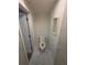 A well-maintained toilet in a small room with tiled floors at 4209 Westwood Dr, Holiday, FL 34691