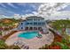Luxury home with a private pool, hot tub, and spacious deck, perfect for outdoor entertaining and relaxation at 440 Capri Blvd, Treasure Island, FL 33706
