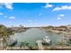 Beautiful water view from the canal front home with several boat docks and boats visible at 440 Capri Blvd, Treasure Island, FL 33706