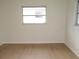 A compact room has natural light with a window at 4517 100Th N Ave, Pinellas Park, FL 33782