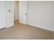 A view of a bedroom that features neutral walls and light wood-look flooring at 4517 100Th N Ave, Pinellas Park, FL 33782