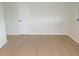 Bedroom shows neutral paint, a white door, and light flooring at 4517 100Th N Ave, Pinellas Park, FL 33782