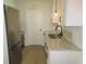 Well-lit kitchen offers stainless steel appliances, granite counters, and white cabinetry at 4517 100Th N Ave, Pinellas Park, FL 33782