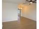 Spacious living room with hardwood floors, ceiling fan and neutral walls, offering a versatile living space at 4517 100Th N Ave, Pinellas Park, FL 33782