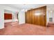 Cozy dining room featuring wood paneling and sliding glass door, ideal for intimate gatherings at 4814 Edmund Ct, Dover, FL 33527