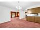 Open-concept dining room with kitchen view, great for entertaining and Gathering meals at 4814 Edmund Ct, Dover, FL 33527