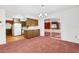 Bright dining room with kitchen access and glass sliding doors to another room at 4814 Edmund Ct, Dover, FL 33527