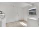 Clean laundry room with modern washer, dryer, water heater and ample lighting at 4814 Edmund Ct, Dover, FL 33527