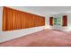 Inviting living room with bright orange curtains and a large window at 4814 Edmund Ct, Dover, FL 33527